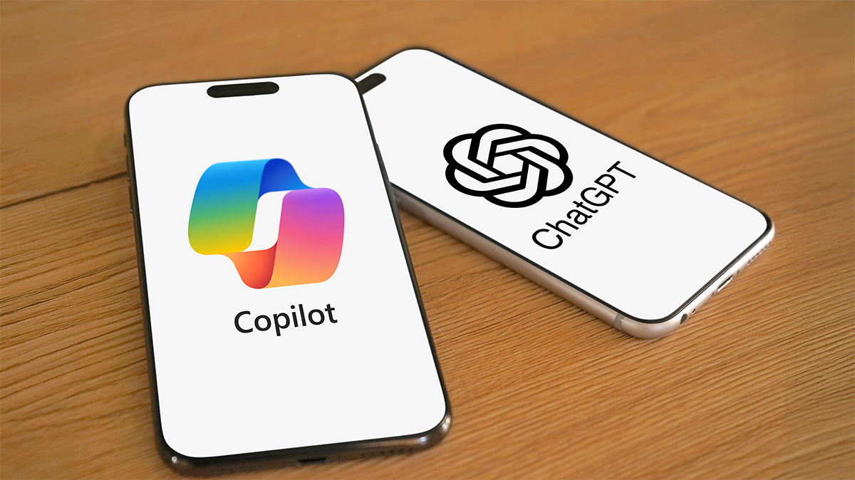 2 phones with logos. One with CoPilot and the other with ChatGPT
